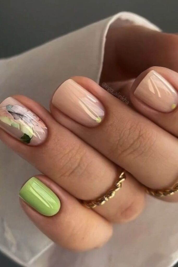 Square nails with abstract black swirl art on white and lavender backgrounds.