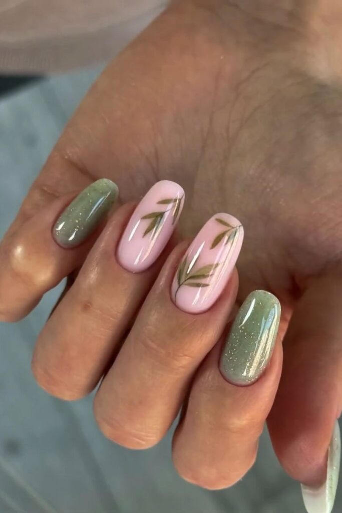 Sage green and pink nails featuring cute bow nail art.